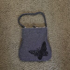 Source Unknown Black Beaded Clutch with Butterfly Accent is with/without strap